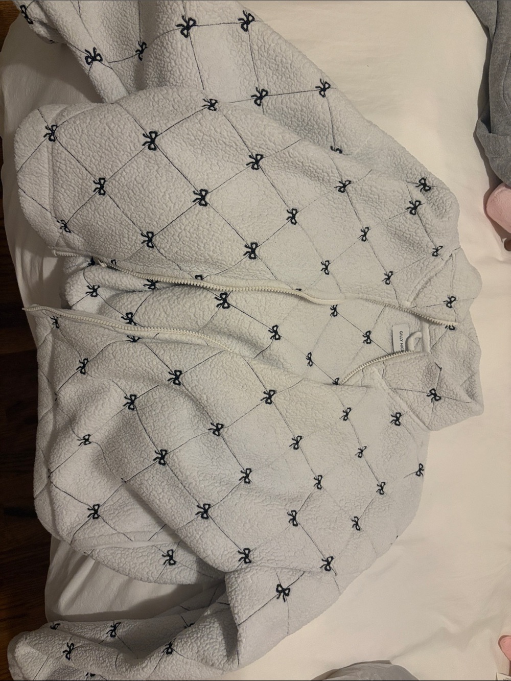 Hollister Cozy White Sherpa Jacket with Black Bow Accent